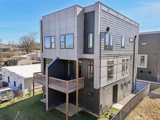 107 E 9th St Unit C5, Columbia, TN 38401 - back of house featuring central air condition unit and a wooden deck