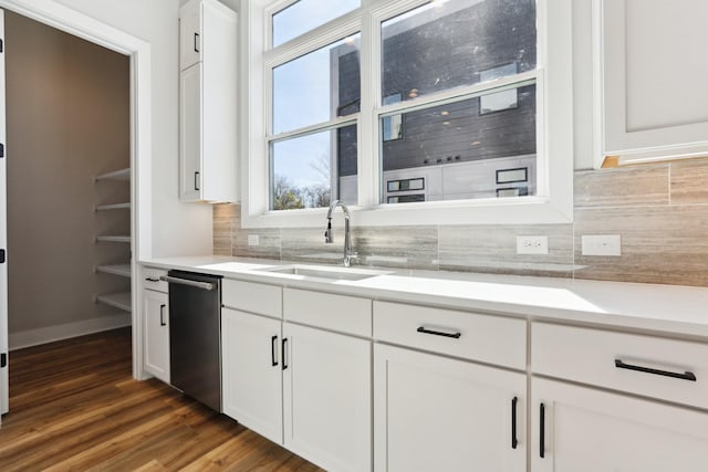 107 E 9th St Unit C5, Columbia, TN 38401 - kitchen with a sink, dishwasher, tasteful backsplash, and light countertops