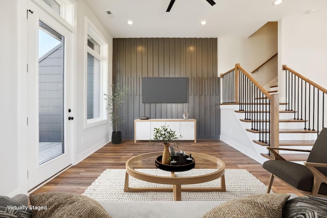 107 E 9th St Unit C5, Columbia, TN 38401 - living area featuring stairs, plenty of natural light, wood finished floors, and recessed lighting