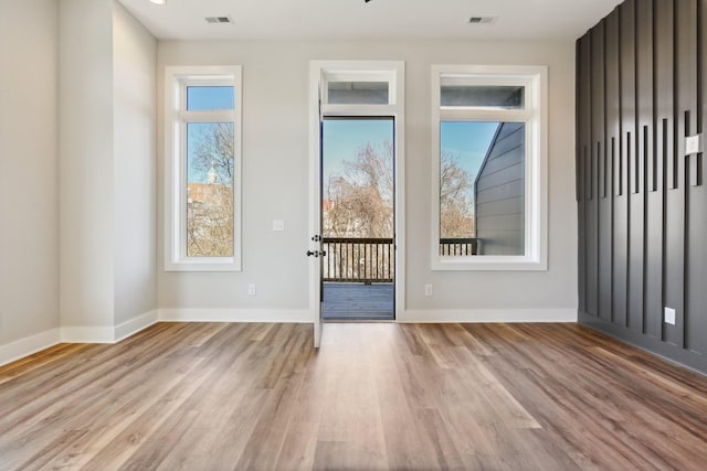 107 E 9th St Unit C5, Columbia, TN 38401 - doorway to outside featuring wood finished floors and baseboards