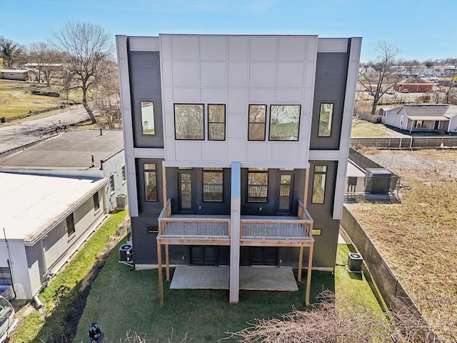 107 E 9th St Unit C5, Columbia, TN 38401 - back of property with a wooden deck and central AC
