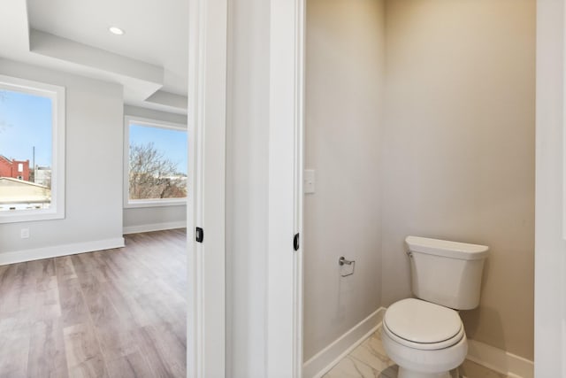 107 E 9th St Unit C5, Columbia, TN 38401 - bathroom with baseboards, toilet, and wood finished floors