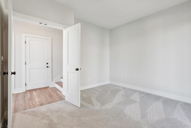 107 E 9th St Unit C6, Columbia, TN 38401 - carpeted empty room featuring baseboards and stairs