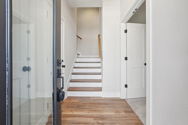 107 E 9th St Unit C6, Columbia, TN 38401 - staircase with wood finished floors and baseboards