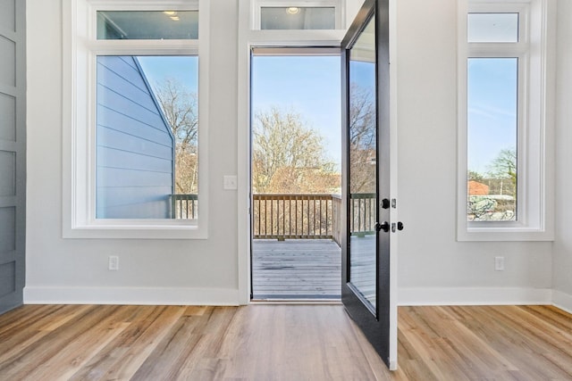 107 E 9th St Unit C6, Columbia, TN 38401 - doorway to outside with wood finished floors, plenty of natural light, and baseboards