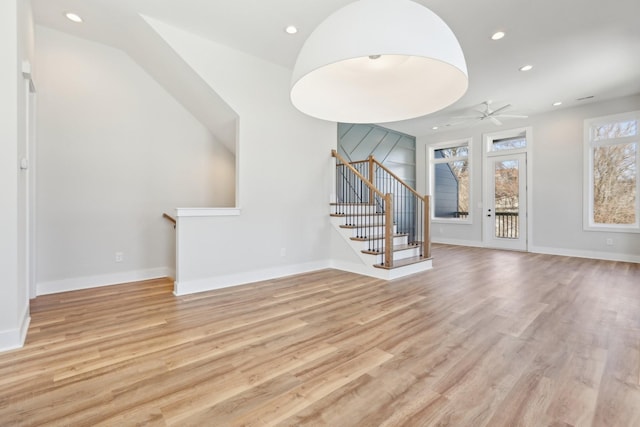 107 E 9th St Unit C6, Columbia, TN 38401 - unfurnished living room with light wood-style floors, recessed lighting, stairs, a ceiling fan, and baseboards