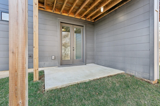 107 E 9th St Unit C6, Columbia, TN 38401 - property entrance featuring french doors, a patio area, and a lawn