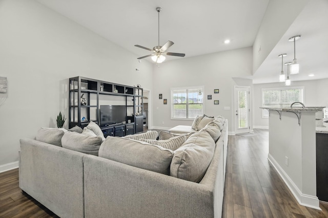 1175 Eagles Nest Ln, Clarksville, TN 37040 - living area featuring a ceiling fan, dark wood-style flooring, baseboards, a high ceiling, and recessed lighting