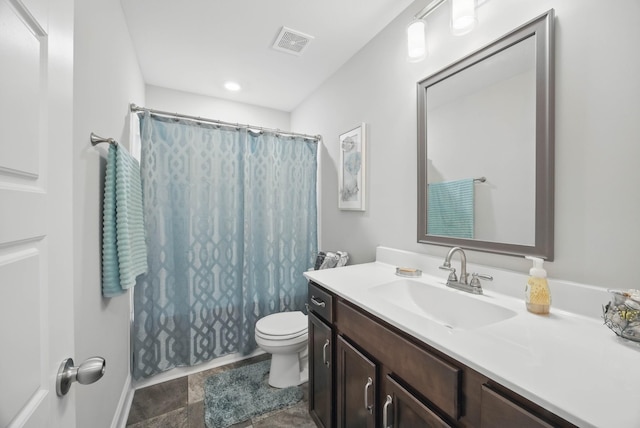 1175 Eagles Nest Ln, Clarksville, TN 37040 - full bath featuring toilet, vanity, stone finish floors, and shower / bathtub combination with curtain