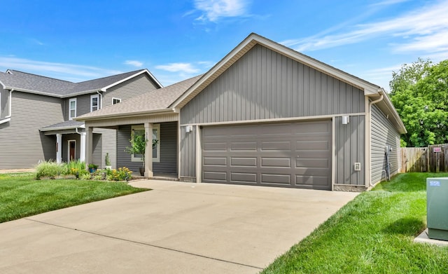 1175 Eagles Nest Ln, Clarksville, TN 37040 - view of front facade with an attached garage, concrete driveway, and board and batten siding