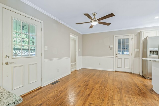 818 N Rutherford Blvd, Murfreesboro, TN 37130 - entryway with ceiling fan, crown molding, and light wood finished floors