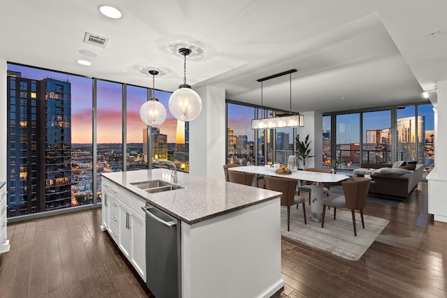 1212 Laurel St Unit 1902, Nashville, TN 37203 - kitchen featuring a sink, a wall of windows, stainless steel dishwasher, a skyline view, and dark wood-style flooring