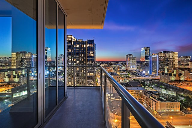 1212 Laurel St Unit 1902, Nashville, TN 37203 - balcony at dusk with a view of city