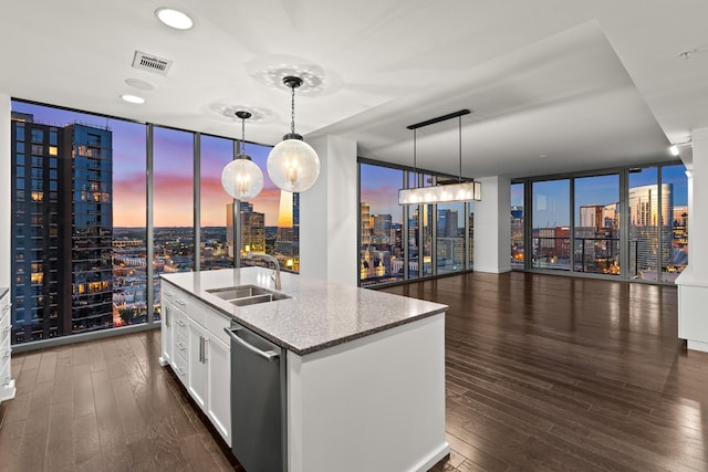 1212 Laurel St Unit 1902, Nashville, TN 37203 - kitchen featuring a wall of windows, a sink, stainless steel dishwasher, a view of skyline, and dark wood finished floors