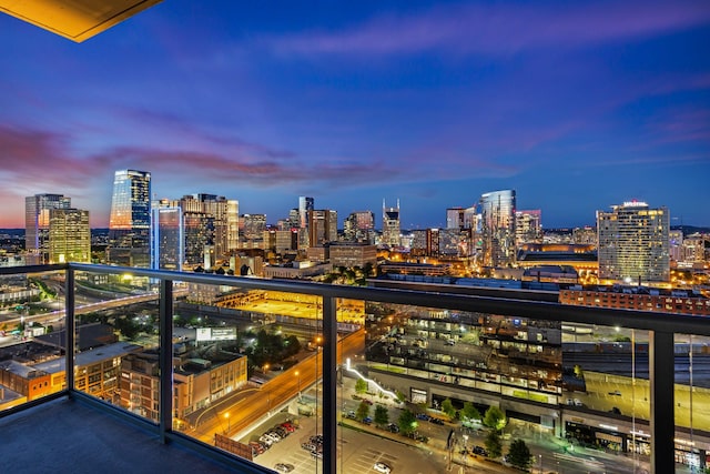 1212 Laurel St Unit 1902, Nashville, TN 37203 - balcony at dusk featuring a view of skyline