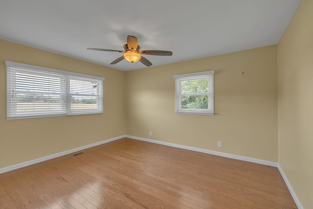 135 Carter Rd, Winchester, TN 37398 - empty room featuring light wood-style flooring, a ceiling fan, and baseboards