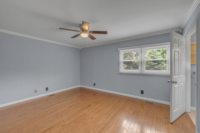 135 Carter Rd, Winchester, TN 37398 - spare room with ceiling fan, light wood finished floors, baseboards, and ornamental molding