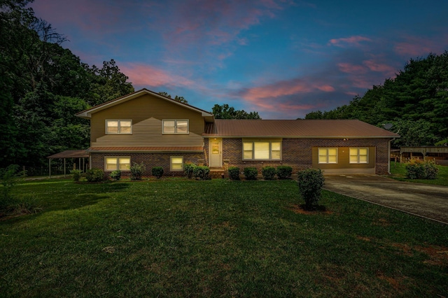 135 Carter Rd, Winchester, TN 37398 - split level home with brick siding, metal roof, and a front yard