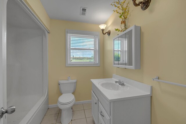 135 Carter Rd, Winchester, TN 37398 - full bathroom with vanity, toilet, tile patterned flooring, baseboards, and a bath