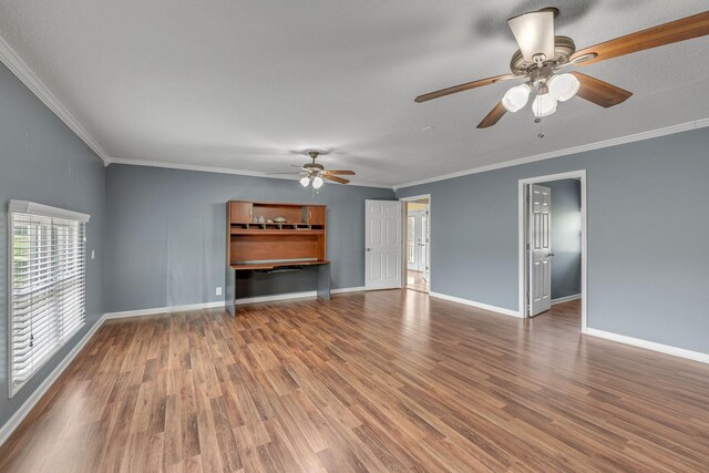 135 Carter Rd, Winchester, TN 37398 - unfurnished living room featuring a ceiling fan, wood finished floors, baseboards, and ornamental molding