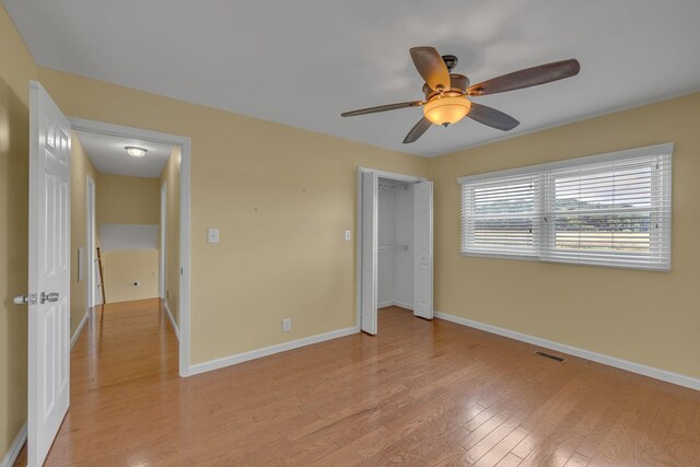 135 Carter Rd, Winchester, TN 37398 - unfurnished bedroom with light wood-style floors, baseboards, ceiling fan, and a closet