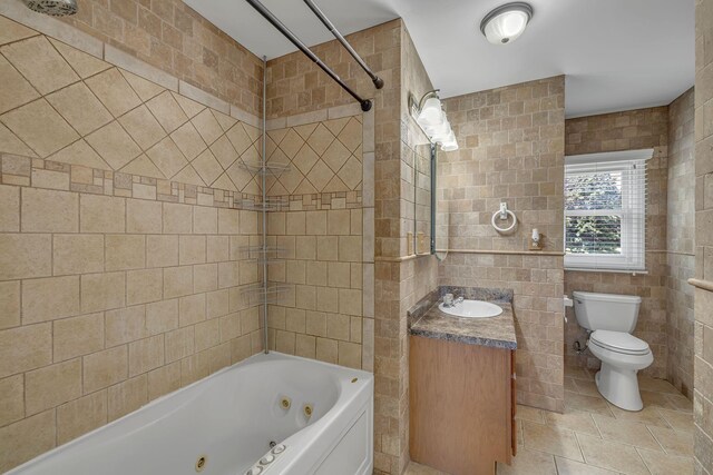 135 Carter Rd, Winchester, TN 37398 - full bath featuring toilet, tile walls, vanity, and a combined bath / shower with jetted tub