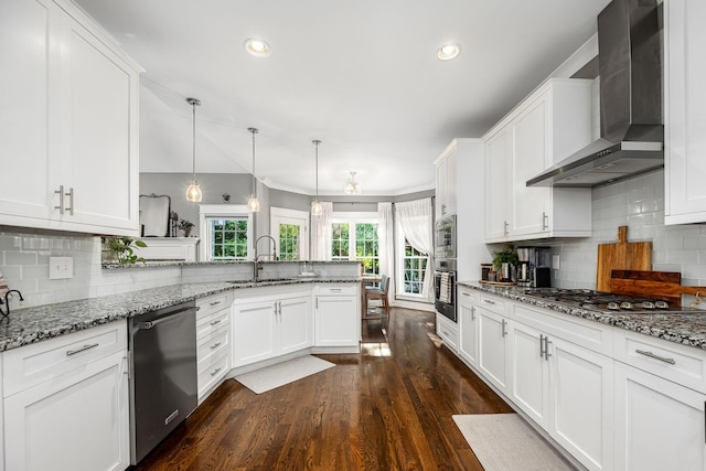 541 Piccadilly Dr, Murfreesboro, TN 37128 - kitchen with stainless steel appliances, wall chimney exhaust hood, a peninsula, dark wood-style floors, and white cabinets