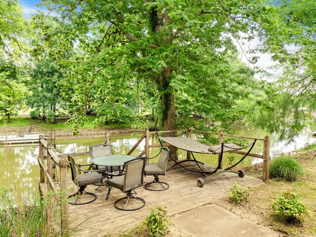 91 Creekside View Ln, Decaturville, TN 38329 - view of patio / terrace featuring a deck with water view