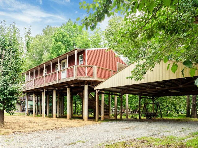 91 Creekside View Ln, Decaturville, TN 38329 - view of front of home with dirt driveway and stairway
