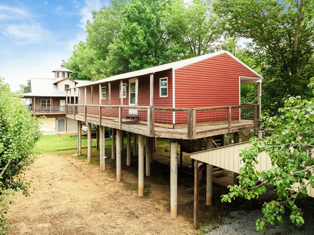 91 Creekside View Ln, Decaturville, TN 38329 - view of front of home with a wooden deck and dirt driveway