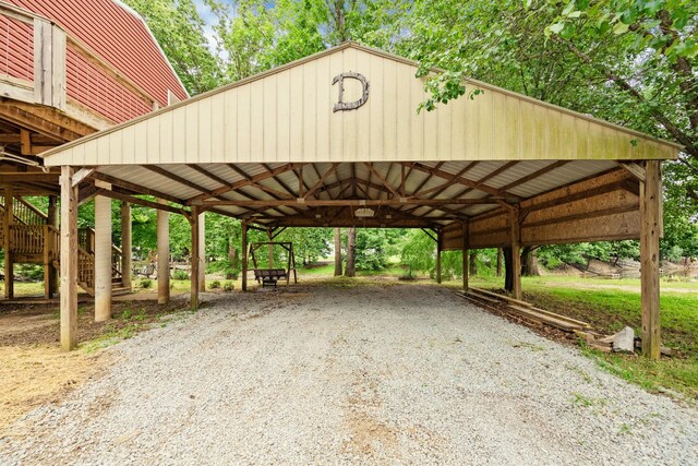 91 Creekside View Ln, Decaturville, TN 38329 - view of parking with a detached carport and stairway