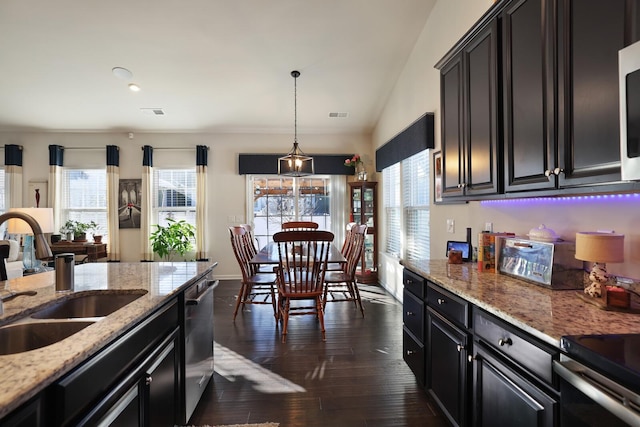 2844 Bluestem Ln, Murfreesboro, TN 37128 - kitchen featuring a sink, dark cabinets, dishwasher, dark wood-type flooring, and light stone countertops