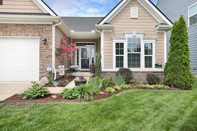 2844 Bluestem Ln, Murfreesboro, TN 37128 - view of front facade with stone siding, a front yard, an attached garage, and a shingled roof