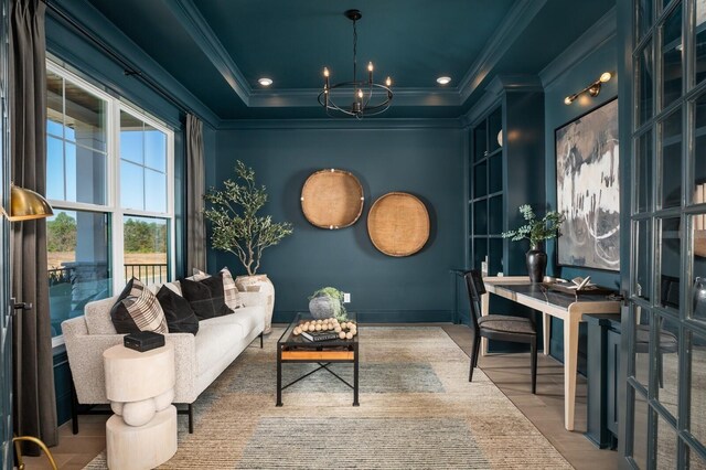 7286 Murrel Dr, Franklin, TN 37064 - living area featuring crown molding, a chandelier, and wood finished floors