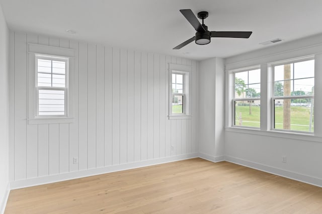 1712 Carvell Ave, Nashville, TN 37203 - empty room featuring light wood-style flooring, baseboards, and a ceiling fan