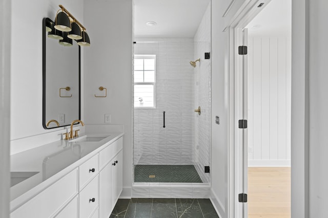 1712 Carvell Ave, Nashville, TN 37203 - bathroom featuring vanity, a stall shower, and baseboards