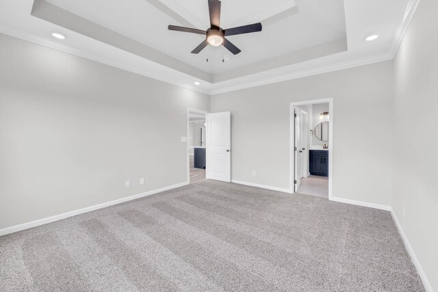 752 Boreal Way, Clarksville, TN 37042 - unfurnished bedroom with carpet, recessed lighting, a tray ceiling, baseboards, and ornamental molding
