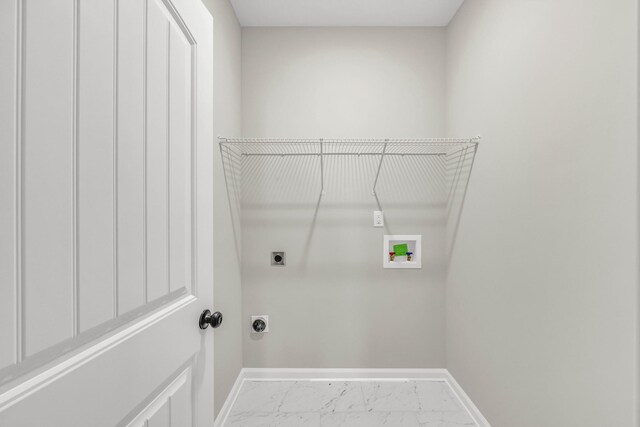 752 Boreal Way, Clarksville, TN 37042 - laundry room featuring hookup for an electric dryer, baseboards, washer hookup, and marble look tiles