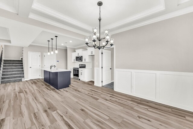 752 Boreal Way, Clarksville, TN 37042 - kitchen featuring appliances with stainless steel finishes, a sink, ornamental molding, white cabinets, and a chandelier