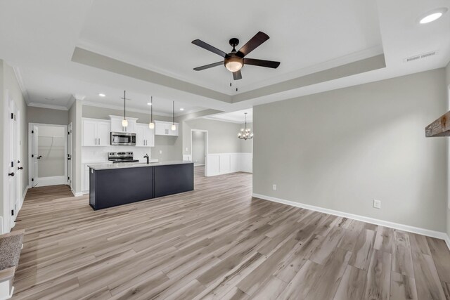 752 Boreal Way, Clarksville, TN 37042 - kitchen featuring appliances with stainless steel finishes, a raised ceiling, open floor plan, ceiling fan, and white cabinets