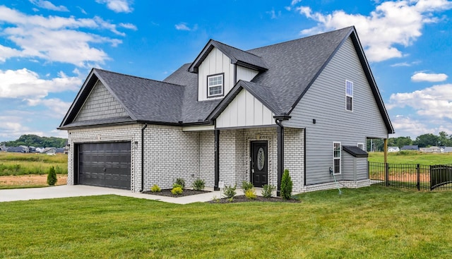 752 Boreal Way, Clarksville, TN 37042 - view of front facade with a shingled roof, board and batten siding, concrete driveway, an attached garage, and brick siding