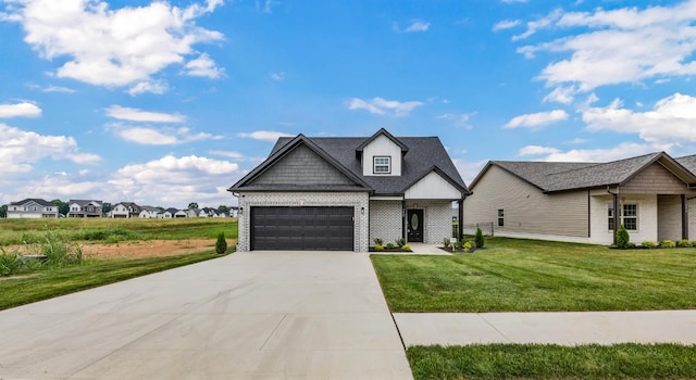 752 Boreal Way, Clarksville, TN 37042 - view of front facade with a garage, a front lawn, brick siding, and driveway