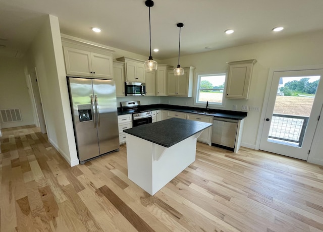 54 Union Hill Rd, Loretto, TN 38469 - kitchen with stainless steel appliances, light wood-type flooring, dark countertops, and recessed lighting