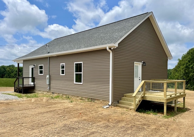 54 Union Hill Rd, Loretto, TN 38469 - view of side of home with a wooden deck and roof with shingles