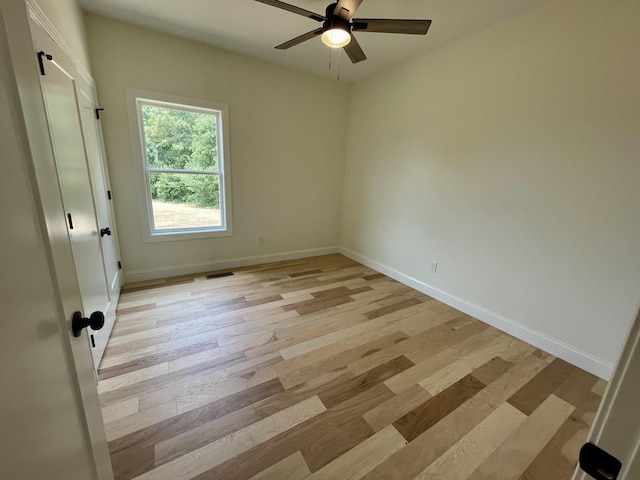 54 Union Hill Rd, Loretto, TN 38469 - unfurnished bedroom featuring light wood-type flooring, baseboards, and a ceiling fan