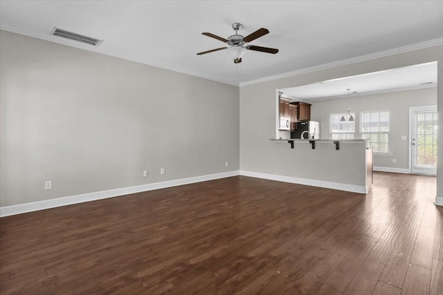 4316 Summercrest Blvd Unit 105, Antioch, TN 37013 - unfurnished living room with a ceiling fan, dark wood-type flooring, baseboards, and ornamental molding