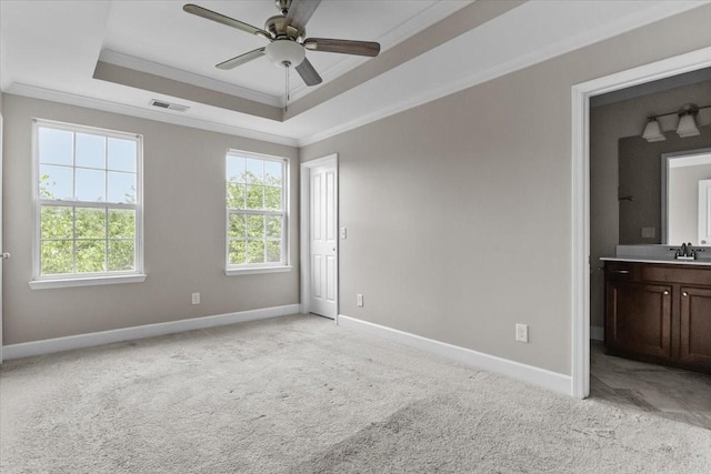 4316 Summercrest Blvd Unit 105, Antioch, TN 37013 - unfurnished bedroom featuring ornamental molding, light colored carpet, a raised ceiling, a sink, and baseboards