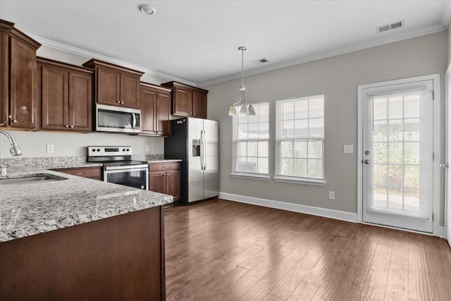 4316 Summercrest Blvd Unit 105, Antioch, TN 37013 - kitchen with stainless steel appliances, a sink, crown molding, dark wood-style floors, and pendant lighting
