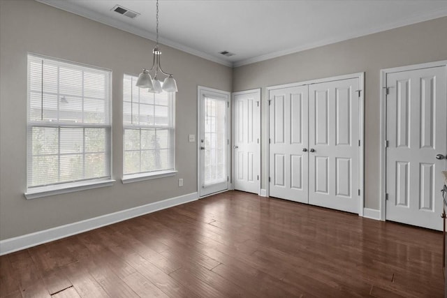 4316 Summercrest Blvd Unit 105, Antioch, TN 37013 - unfurnished dining area with a chandelier, crown molding, baseboards, and dark wood-style floors
