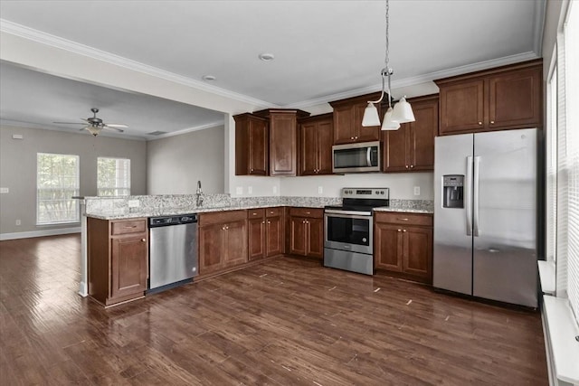 4316 Summercrest Blvd Unit 105, Antioch, TN 37013 - kitchen with stainless steel appliances, ornamental molding, dark wood-type flooring, a peninsula, and a ceiling fan